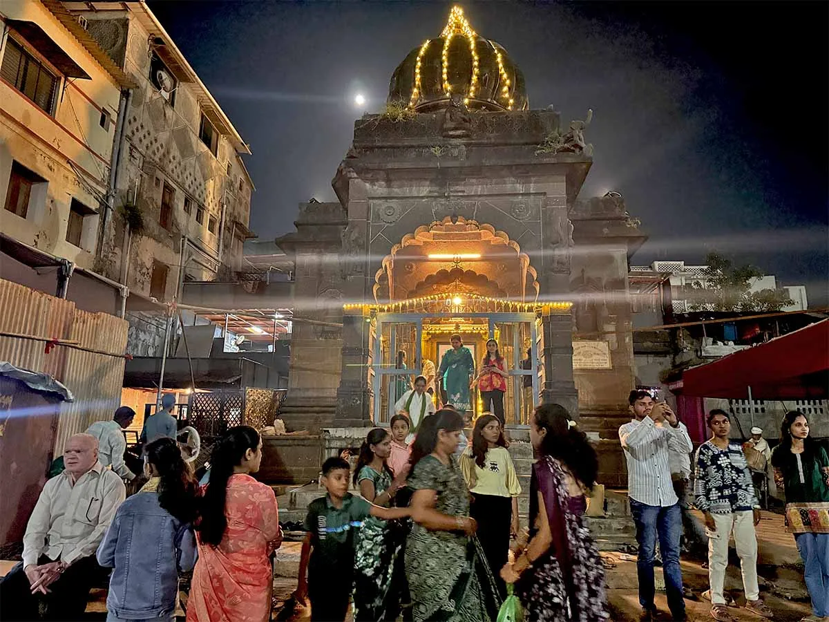 Devotees visit temples near Ramkund Nashik Maharashtra on Dev Diwali