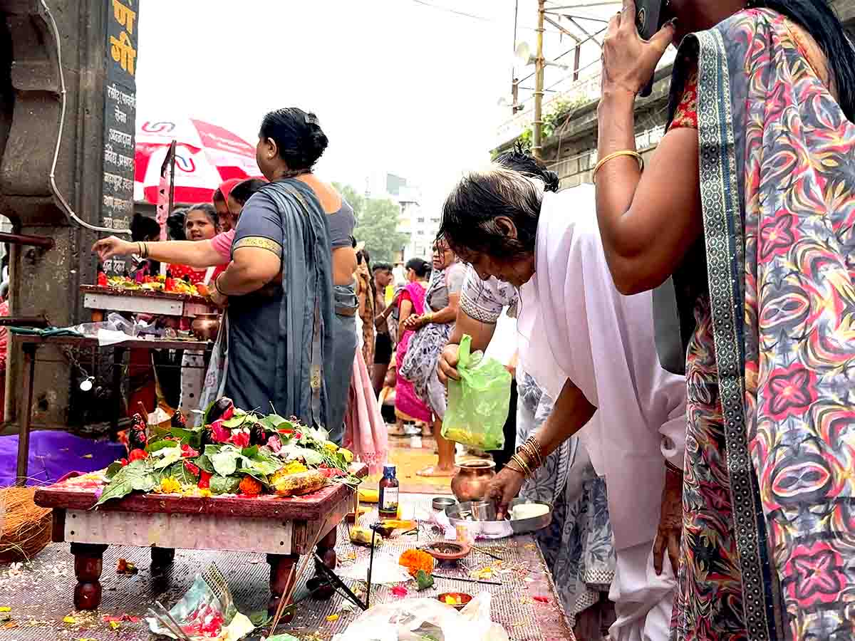 Women Devotees Performing Rituals at Ramkund Ghat