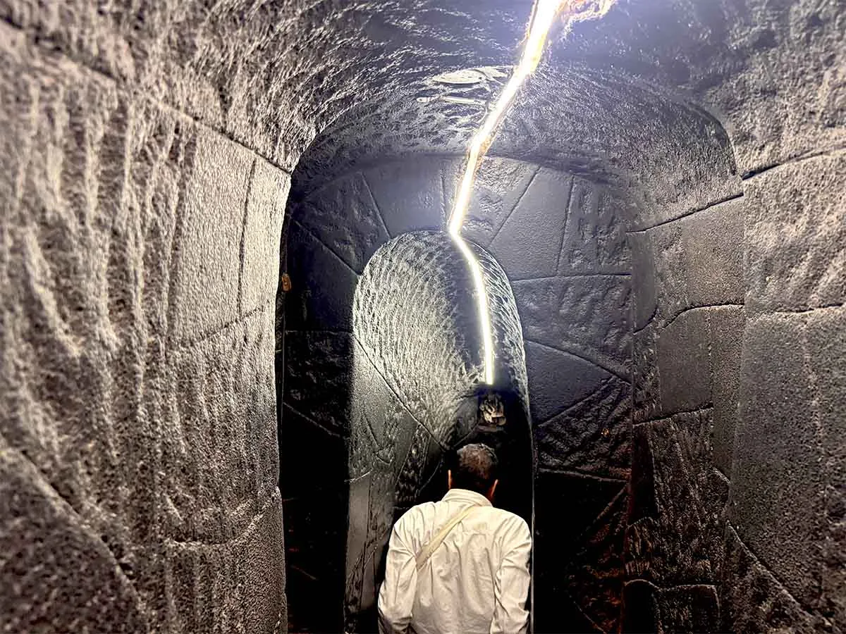 Entering the cave at Sita Gufa