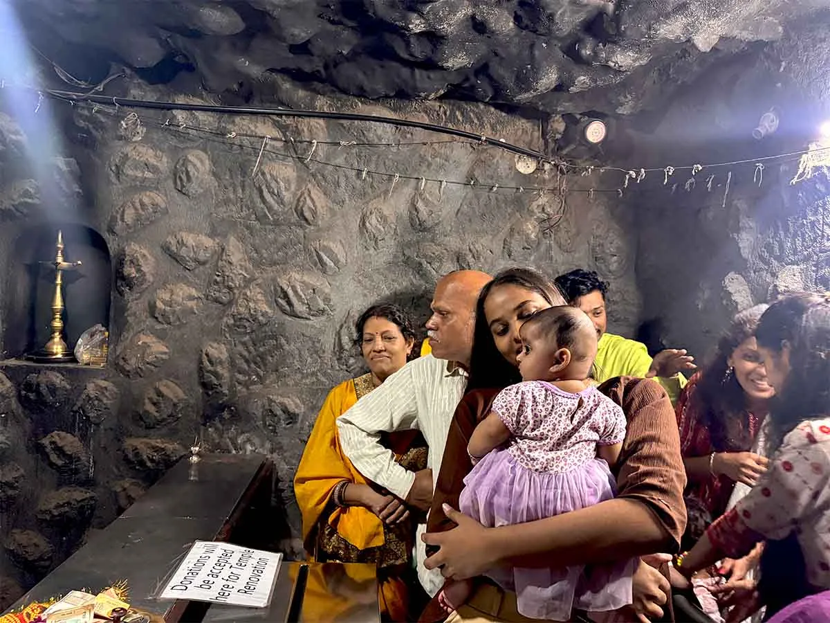 Devotees taking darshan inside Sita Gufa temple. Photos July 2026