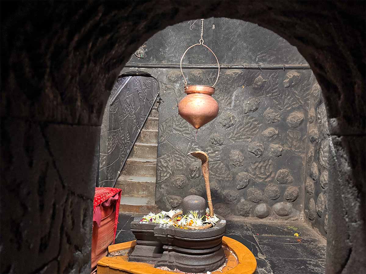 Fourth chamber inside Sita Gufa cave temple with the sacred Shiva Lingam