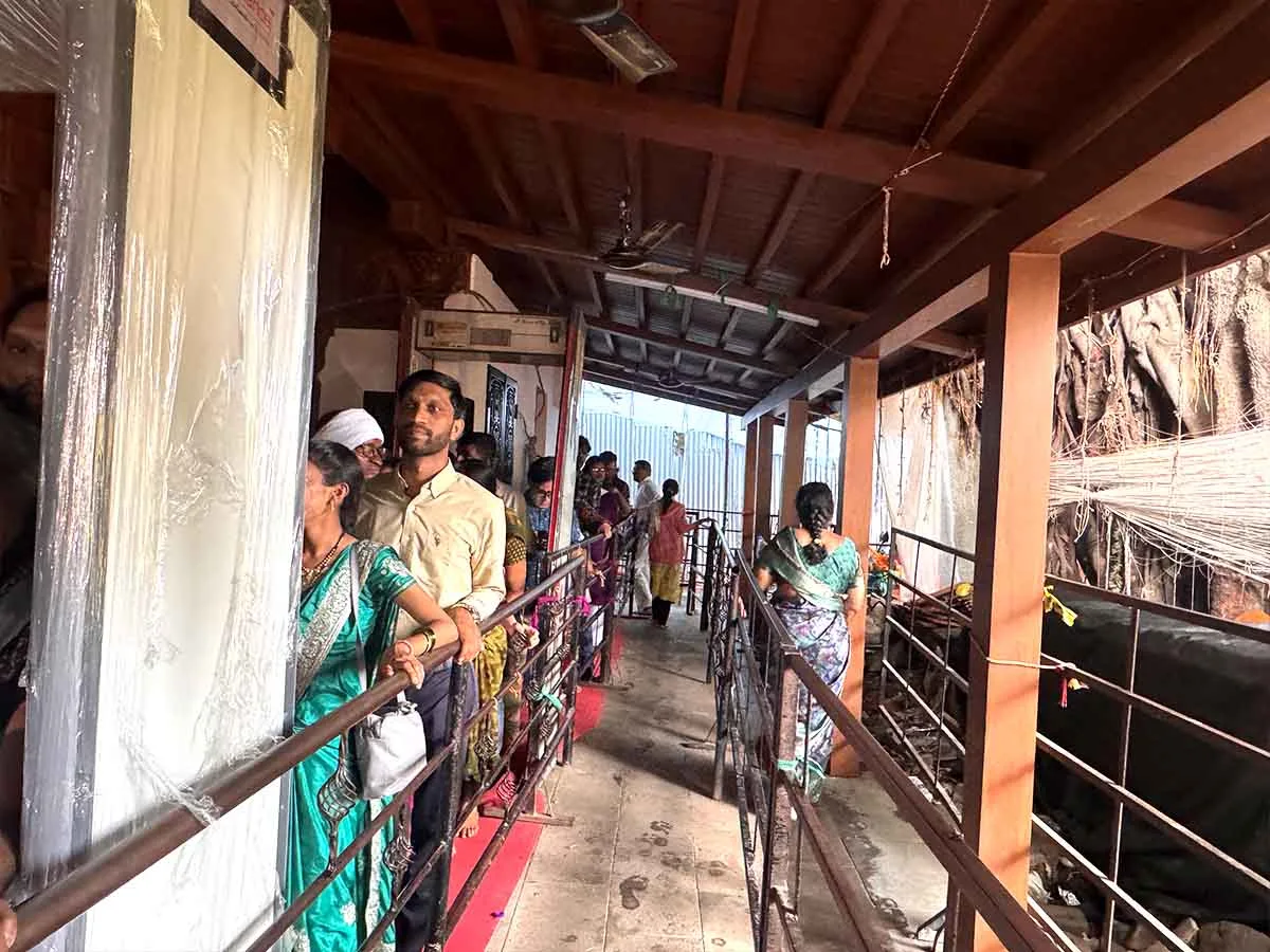 Steel railings set up outside the temple to regular flow of devotees into the temple